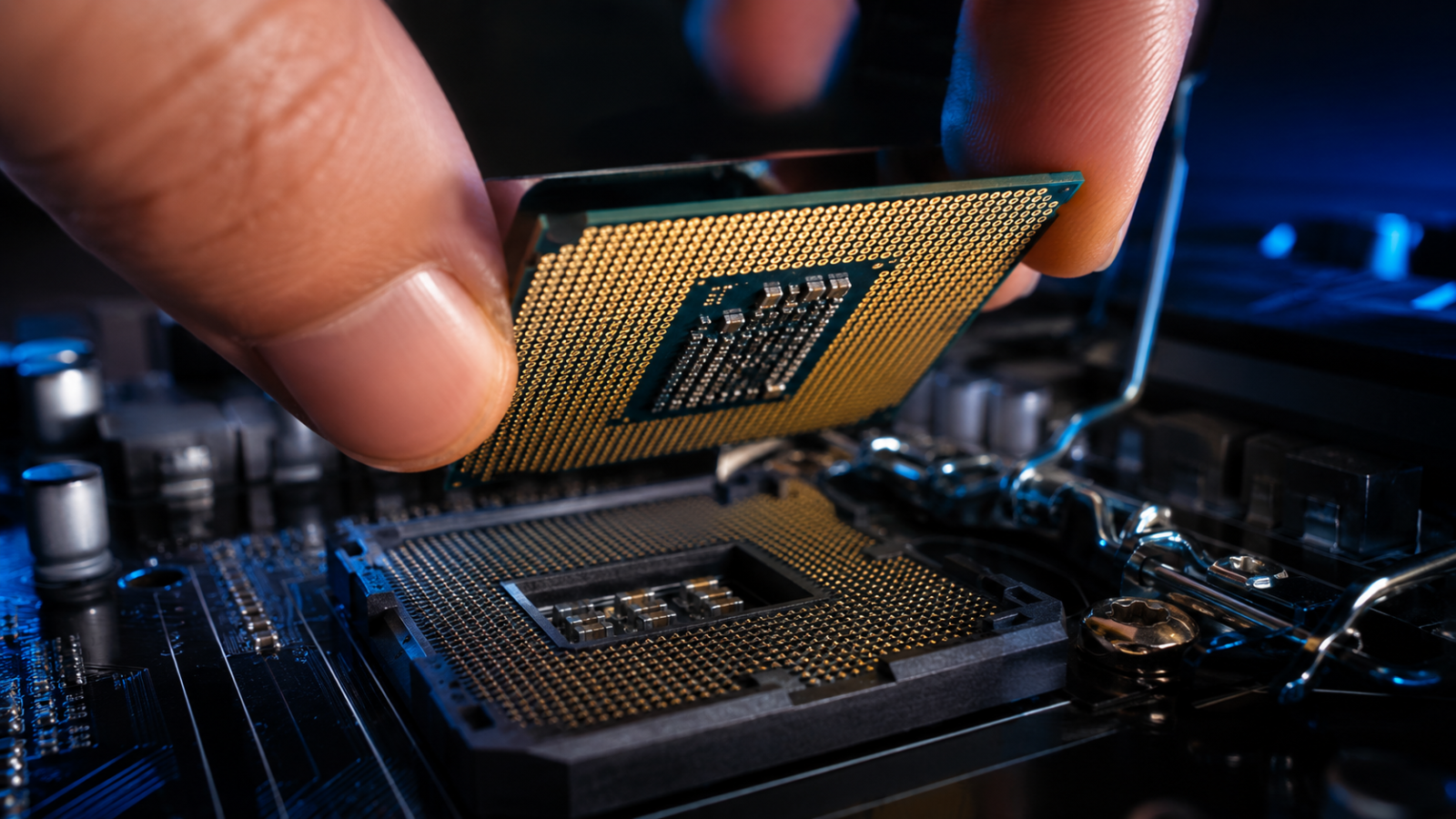 AMD Ryzen processor chip held above an AM4 motherboard socket, representing the best AM4 CPU for gaming in 2026